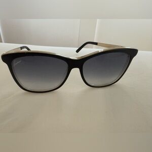 Gucci Women's Sunglasses with Black Frame and Gold Trim